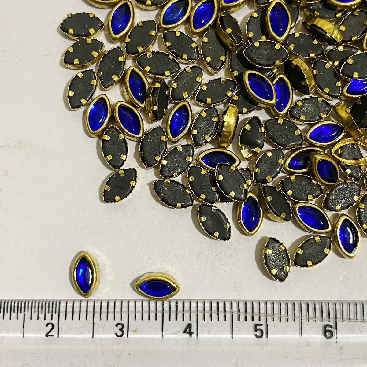 Glass Kundan Stones in Flat Back Mounts Eye Shape 6x4MM (Blue)15grams
