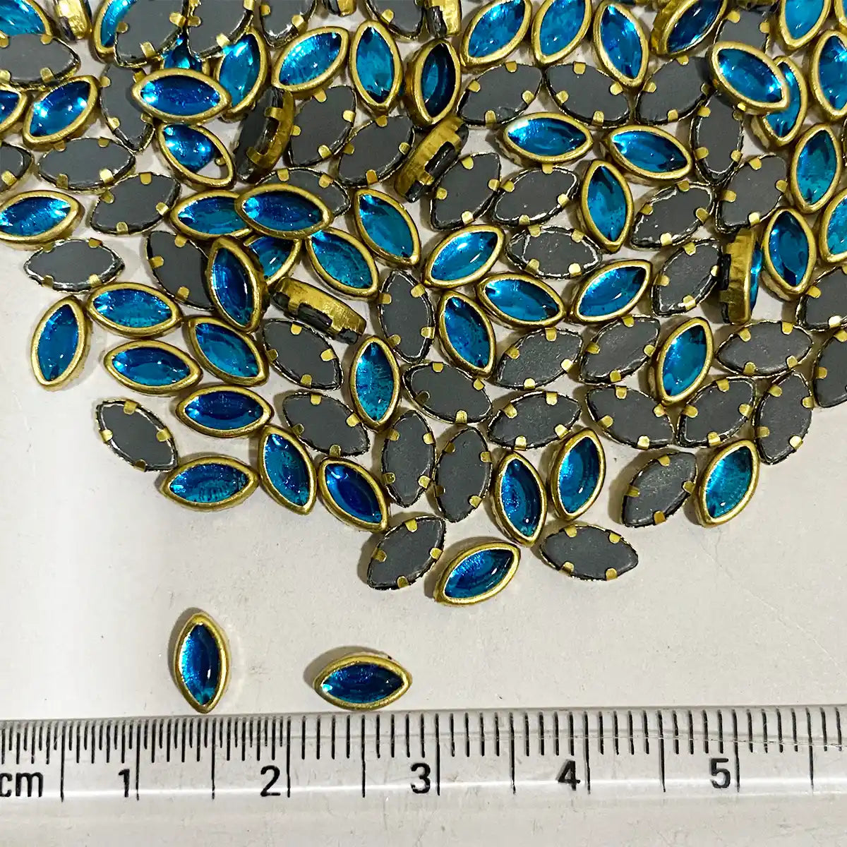 Glass Kundan Stones in Flat Back Mounts Eye Shape 6x4MM (Sky Blue)15grams