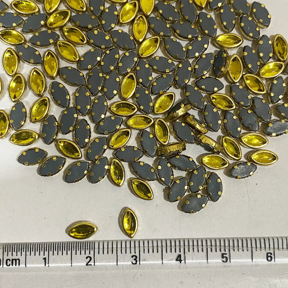 Glass Kundan Stones in Flat Back Mounts Eye Shape 6x4MM (Yellow)15grams