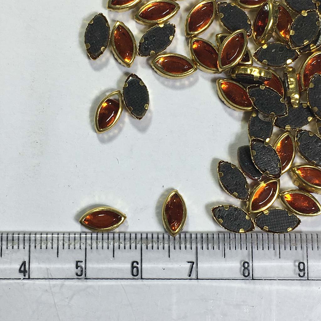 Glass Kundan Stones in Flat Back Mounts Eye Shape 8x5MM (Orange) 20grams