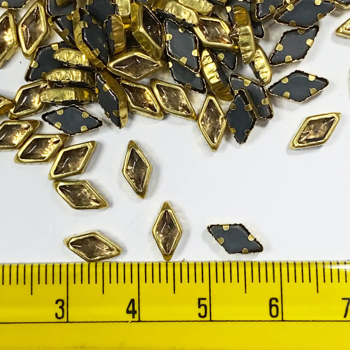 Kundan Stone Flat Back Framed Diamond Shape 8mmX5mm Color Gold (25grams)