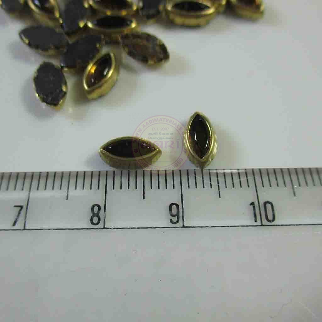 Kundan Stone Flat Back Framed Eye Shape 8mmX5mm Color Gold (25grams)