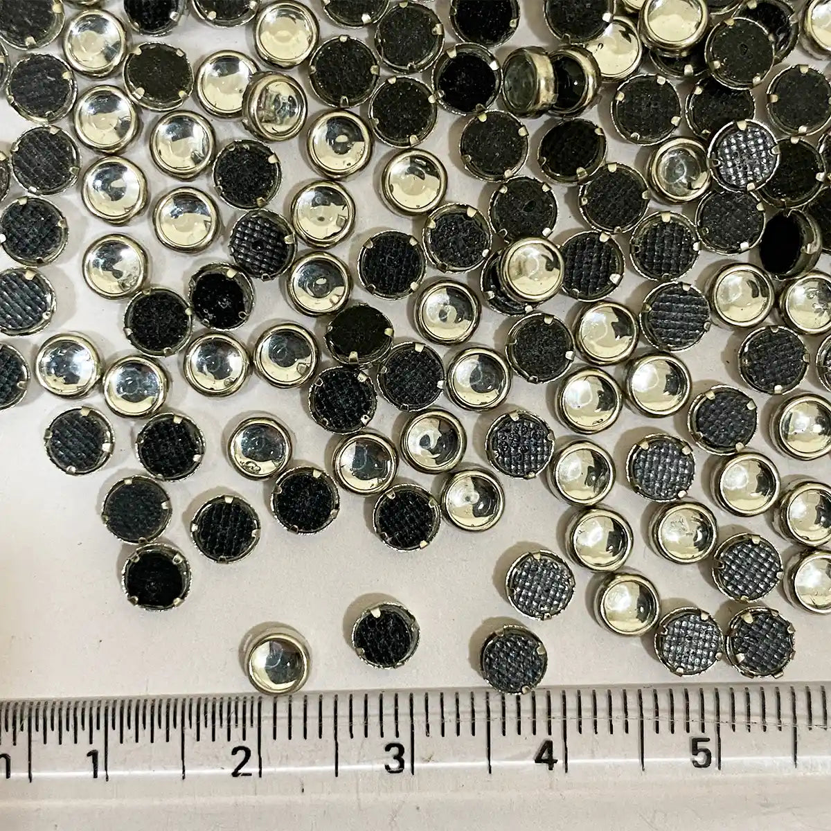 Kundan Stone Framed Round Shape 4mm White Color Silver Base (20grams)