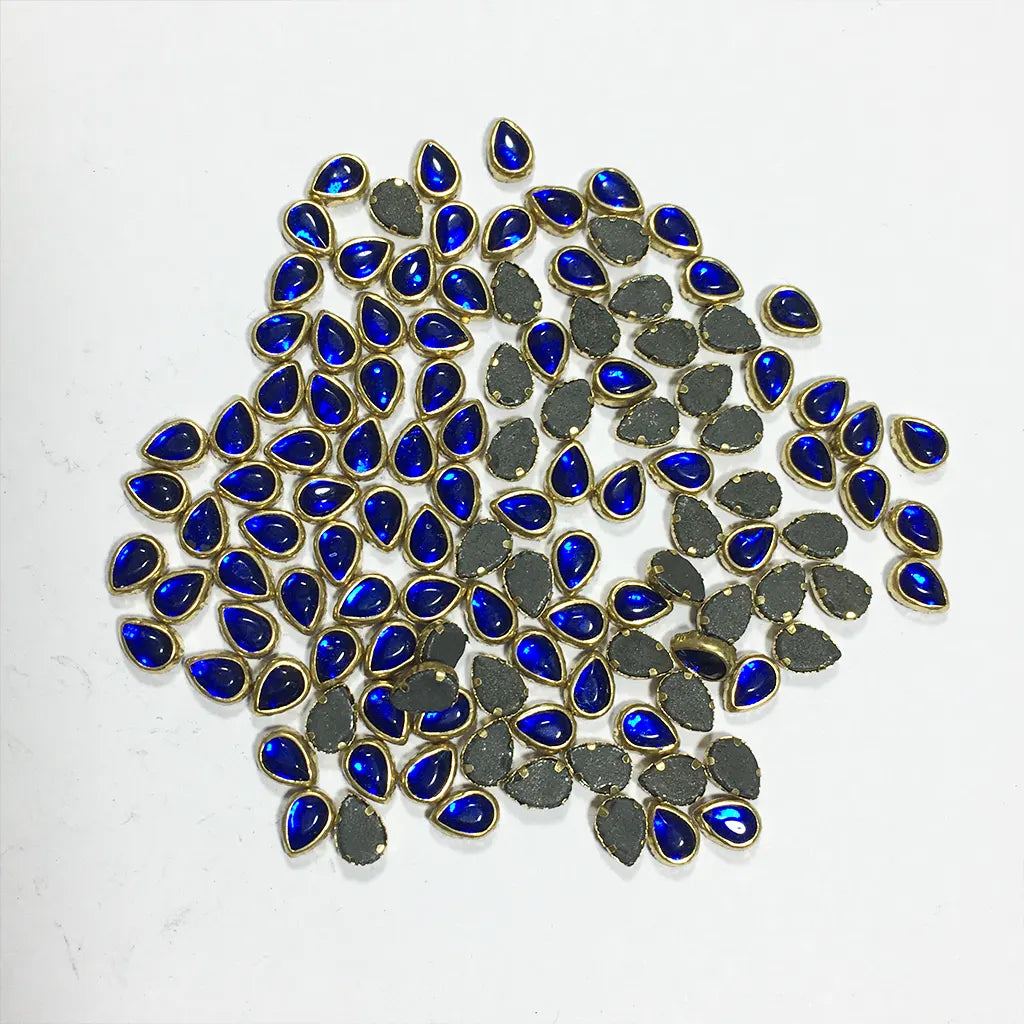 Glass Kundan Stone Framed Teardrop Shape Blue Color 6mmX4mm (20grams)