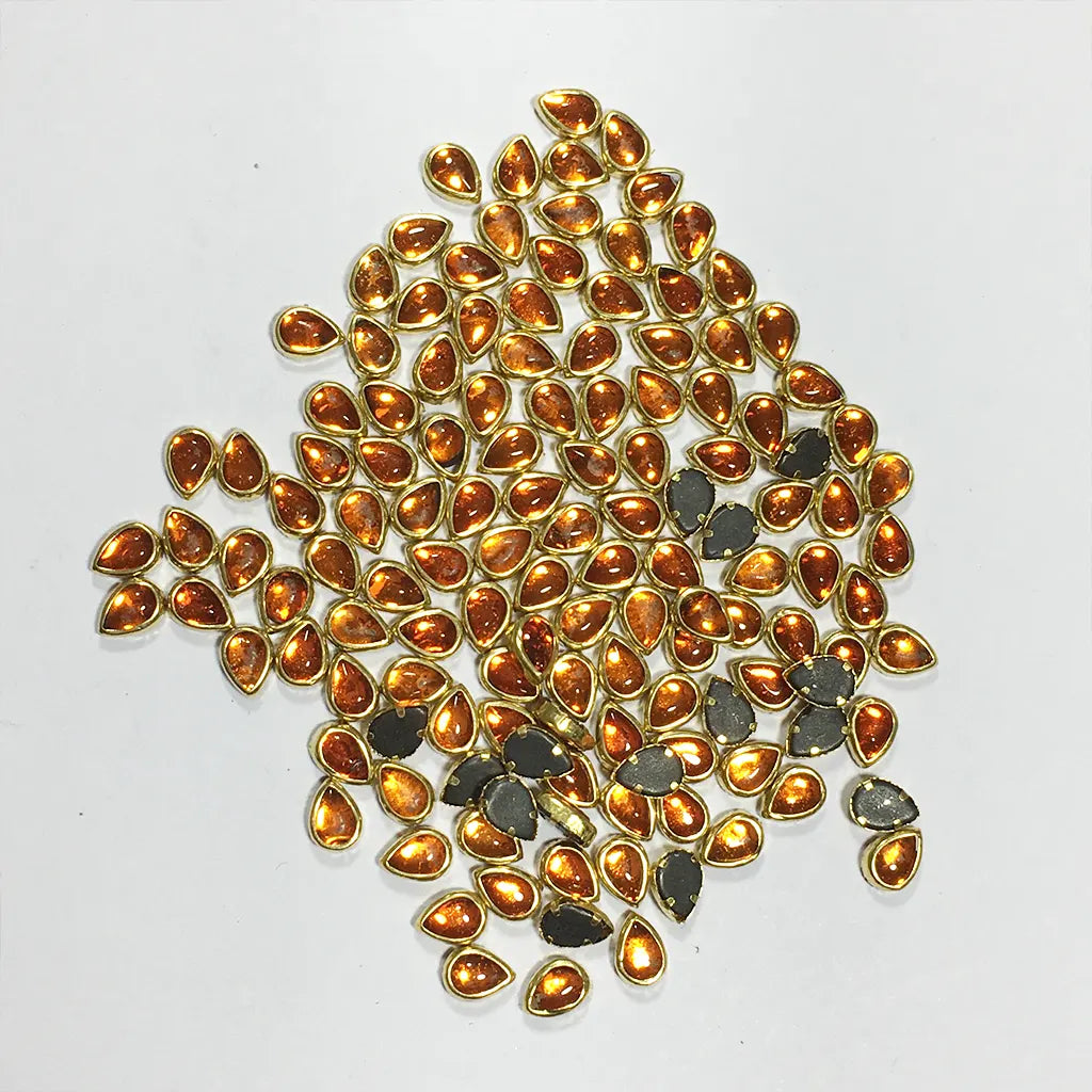 Glass Kundan Stone Framed Teardrop Shape Orange Color 6mmX4mm (20grams)