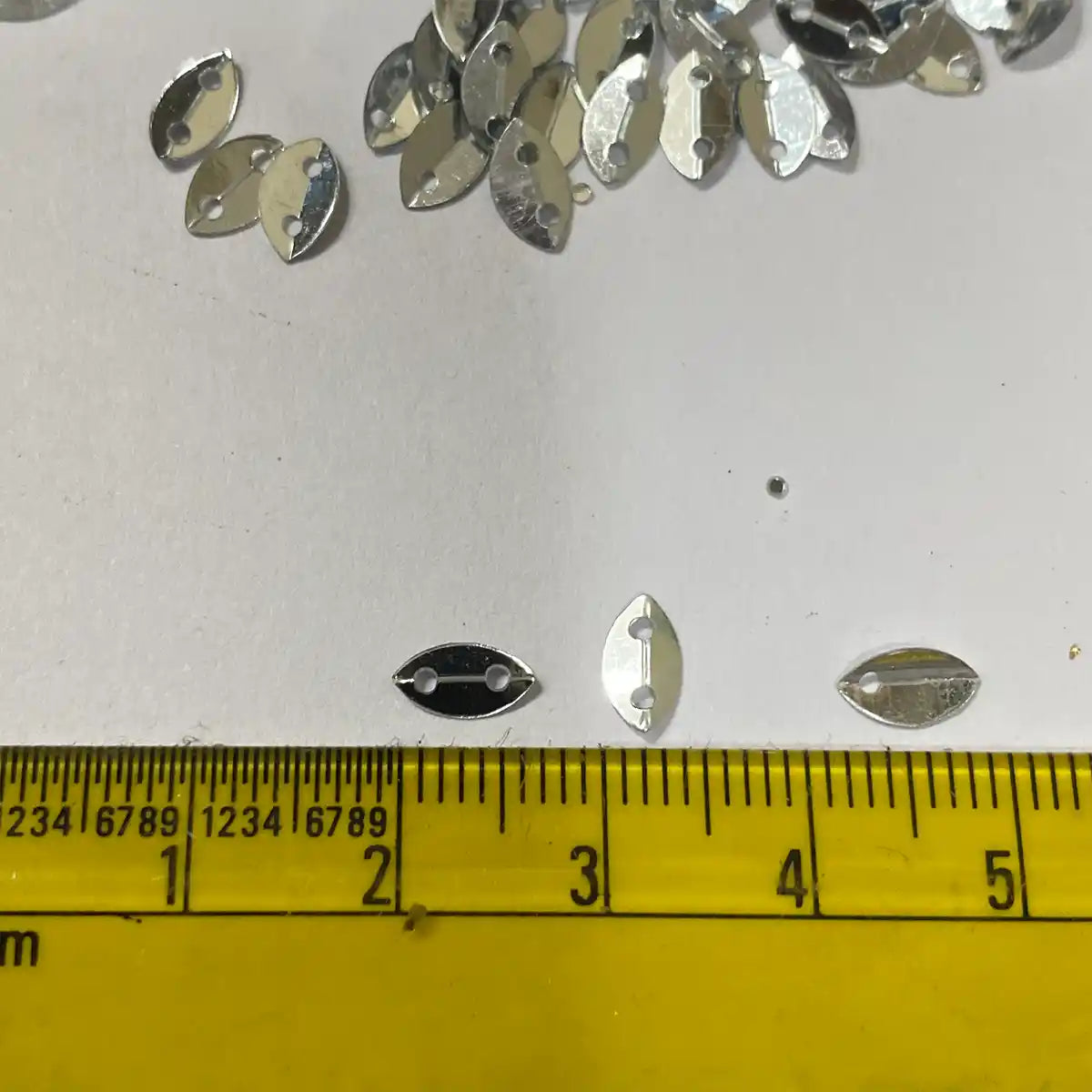 Silver Colour 2 Hole Leaf Shape Sequins Size 6×4 mm – 10grams