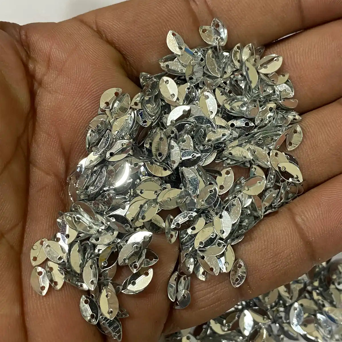Silver Colour 2 Hole Leaf Shape Sequins Size 6×4 mm – 10grams