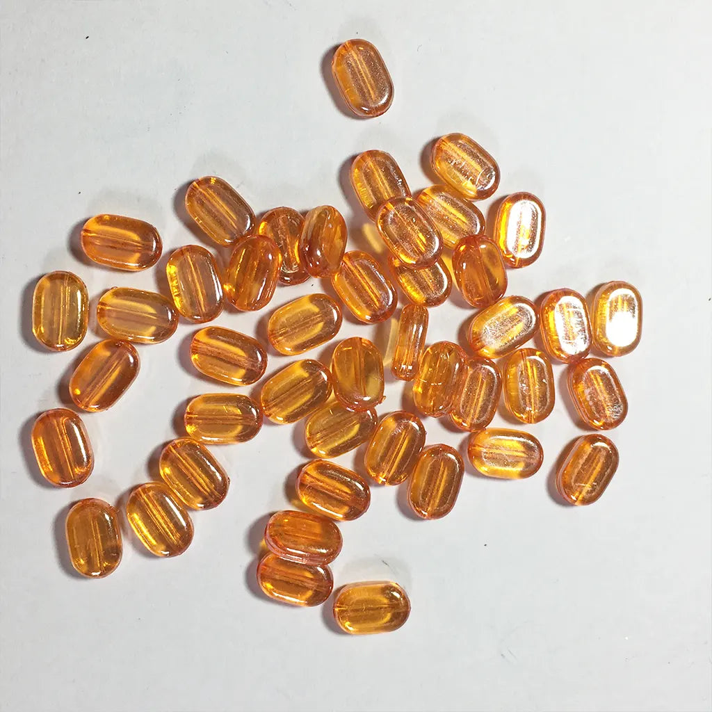 Transparent or Glossy Tablet beads Oval shape Size 10x7x4mm (10 Grams)