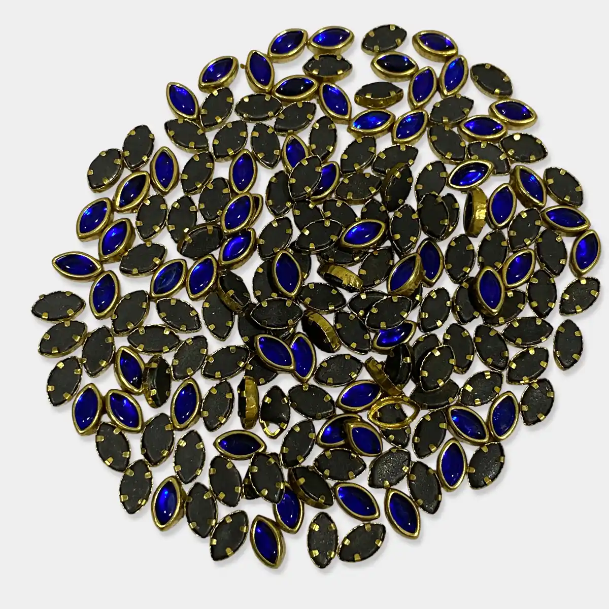 Glass Kundan Stones in Flat Back Mounts Eye Shape 6x4MM (Blue)15grams 1 Glass Kundan Stones in Flat Back Mounts Eye Shape 6x4MM (Blue)15grams - Image 1