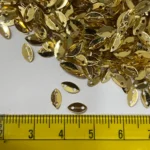 Golden Colour 2 Hole Leaf Shape Sequins Size 6×4 mm - 10grams - Image 3